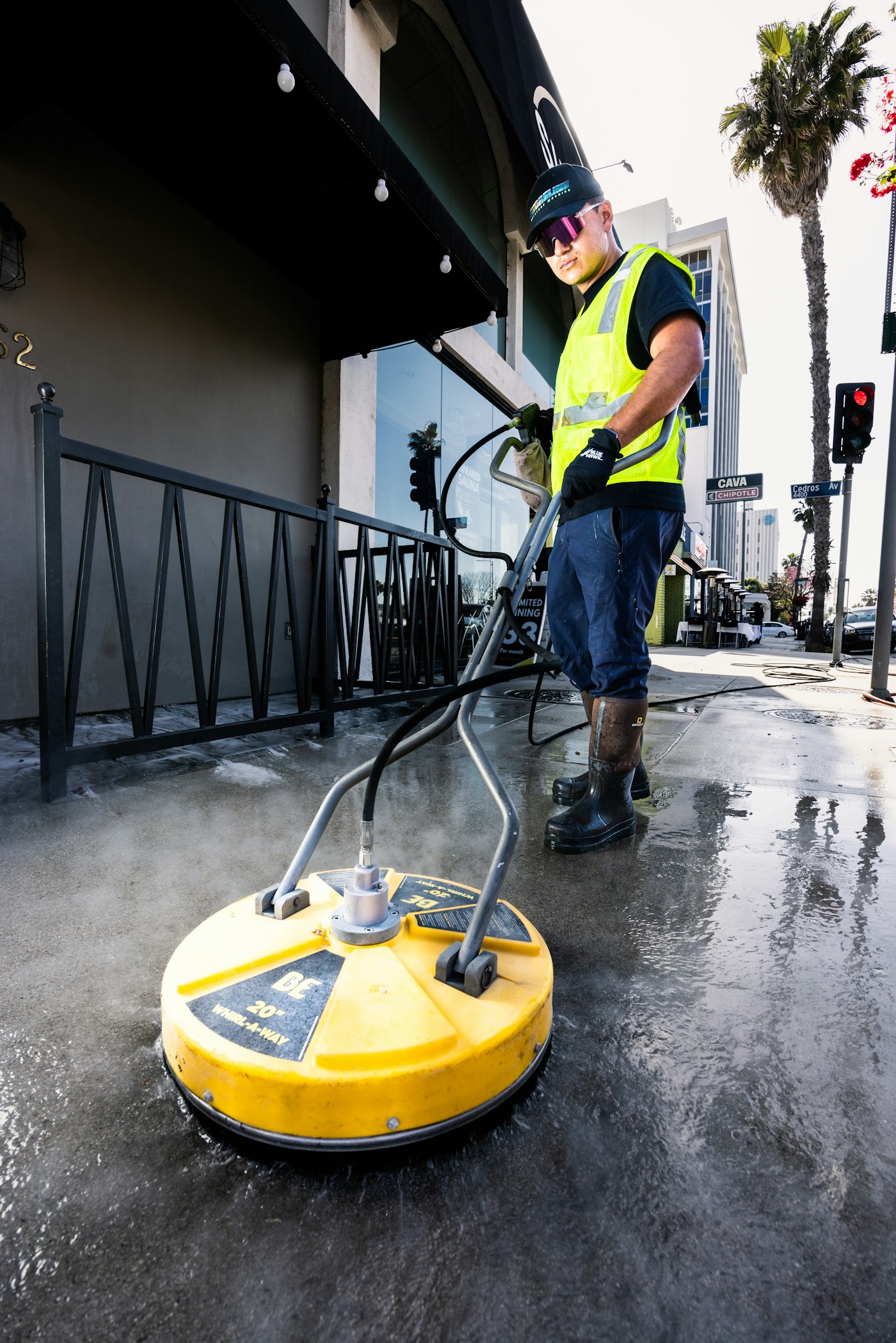 Pressure washing on a residential street
